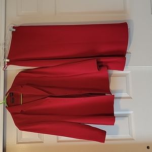 Ladies suit, with mid calf skirt. Jacket is size 14, skirt is a size 12.